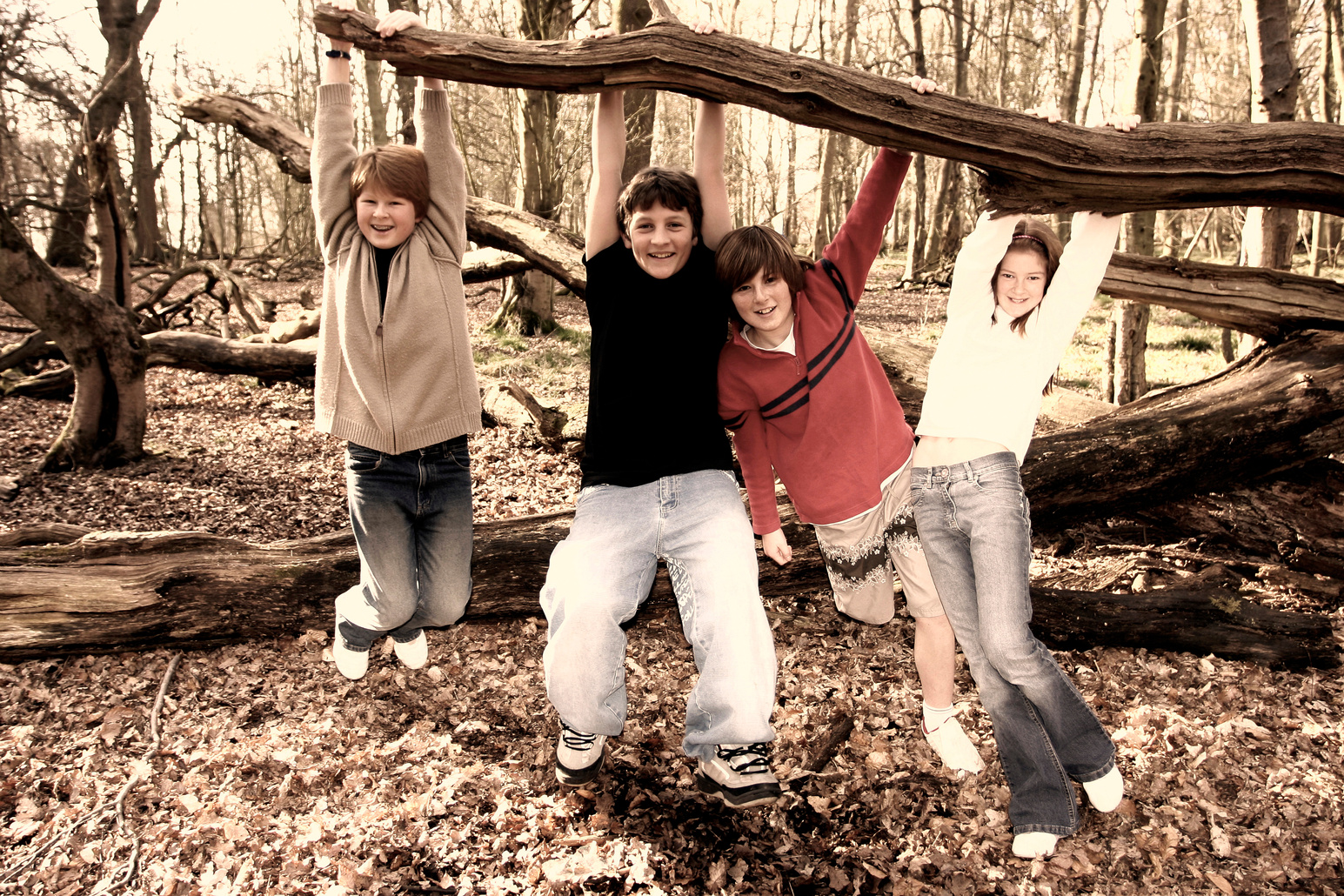 A group of kids hanging out in the woods